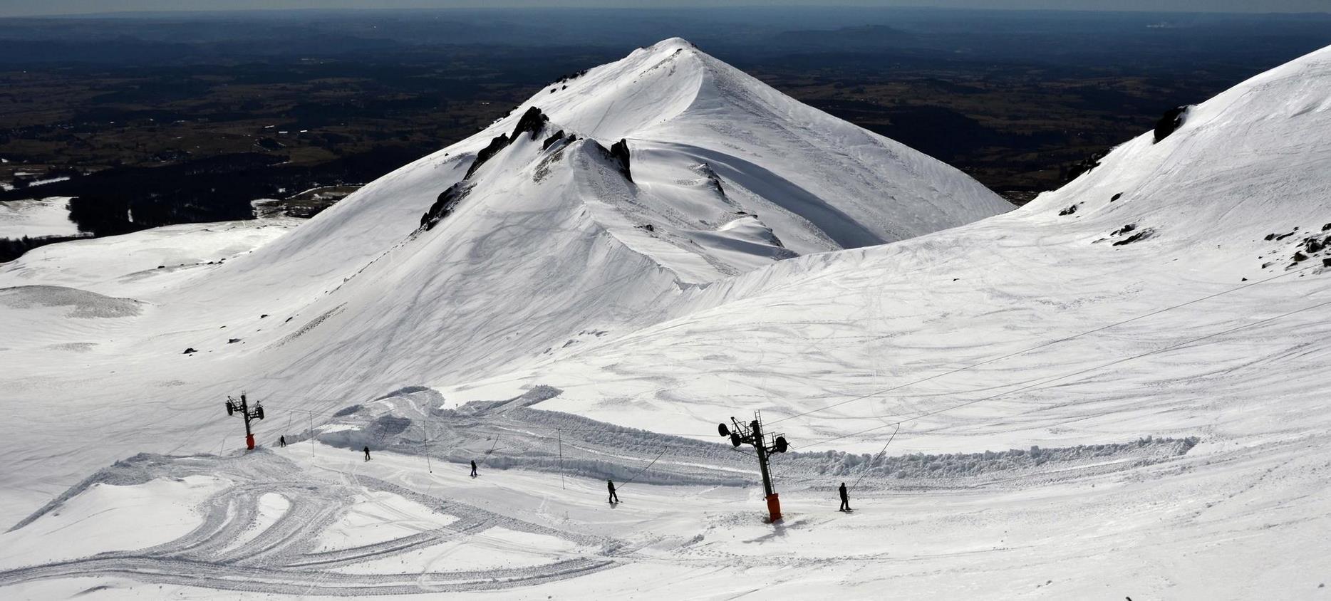 Super Besse: Ski Lift and Snow-Capped Peaks, A Magical Moment