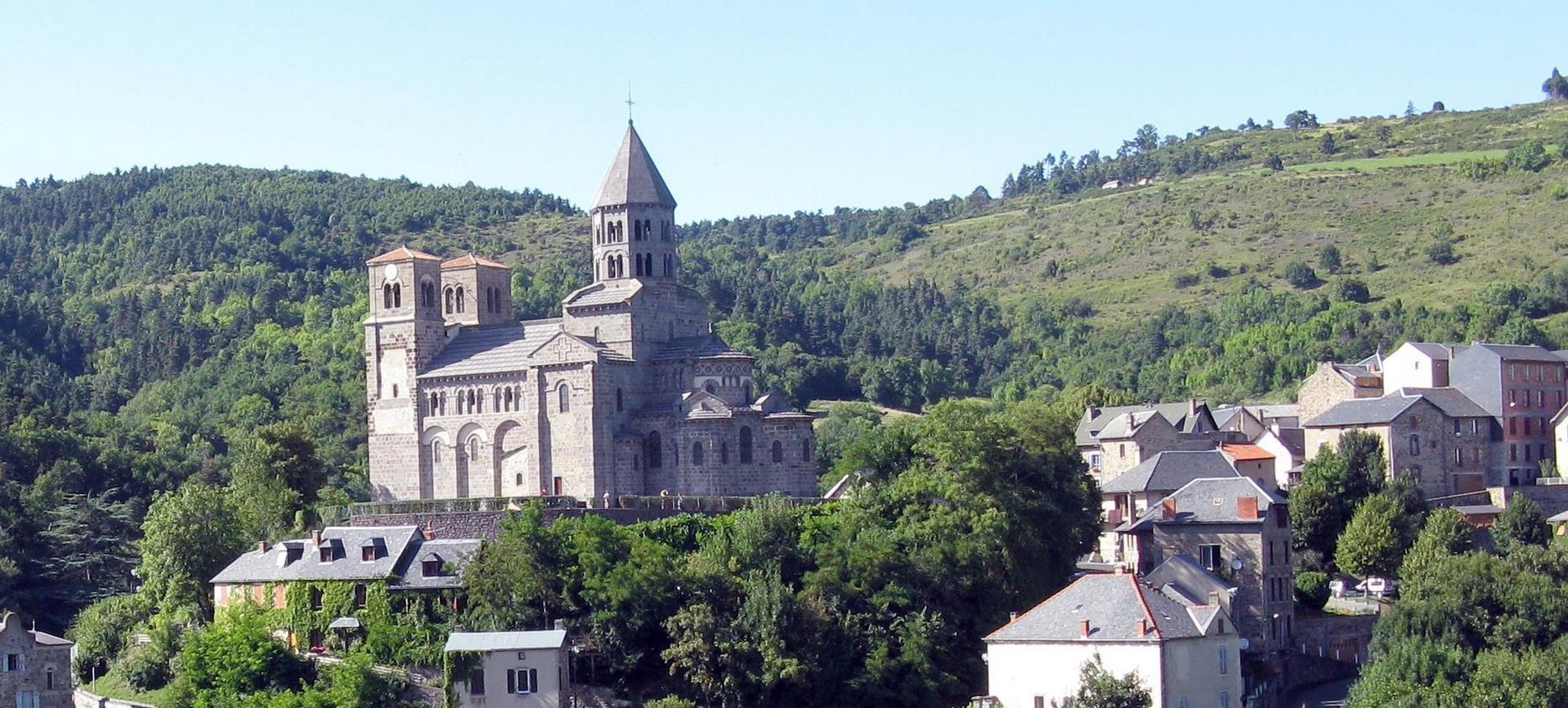 Saint-Nectaire: Majestic Church overlooking the Village of Auvergne