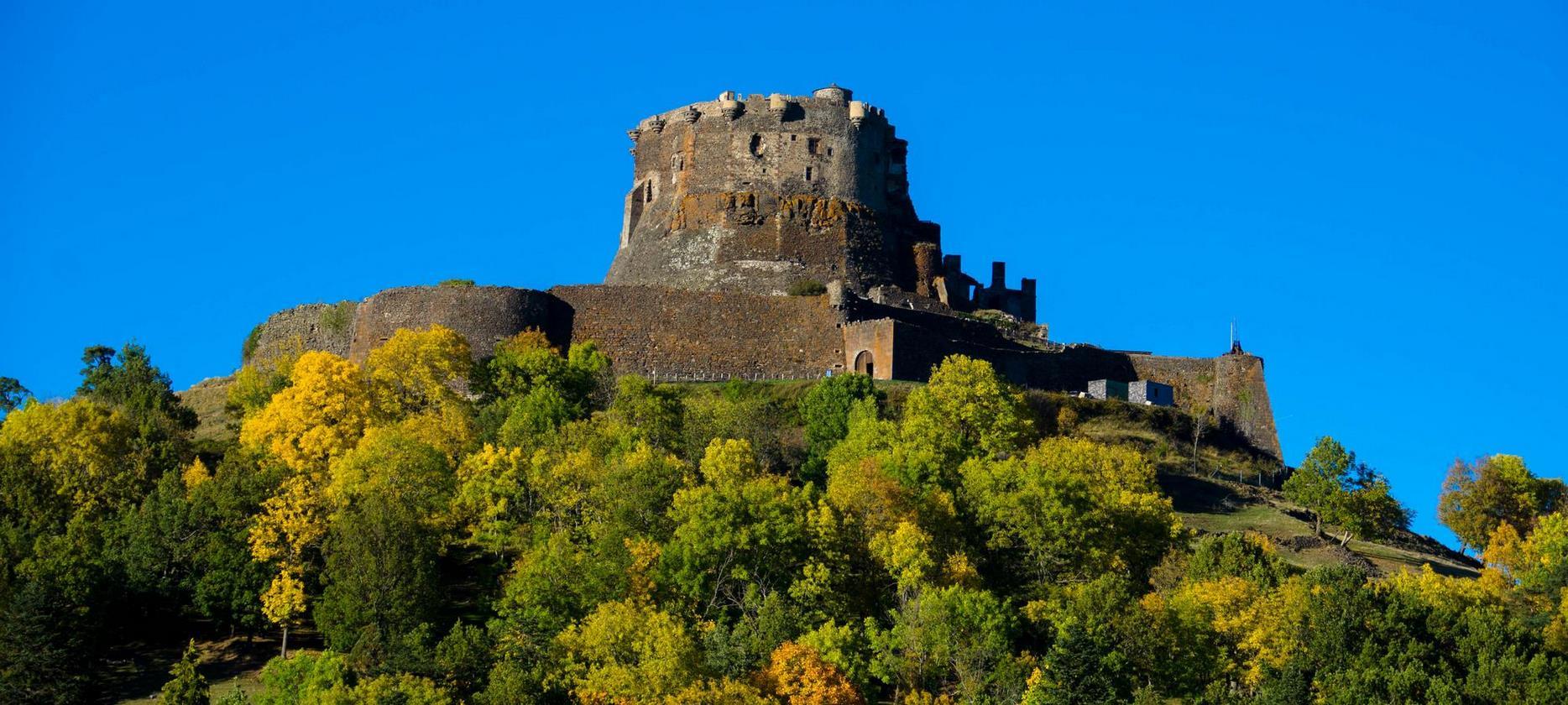 Super Besse: Murol Castle, a fortified castle overlooking the village of Murol.