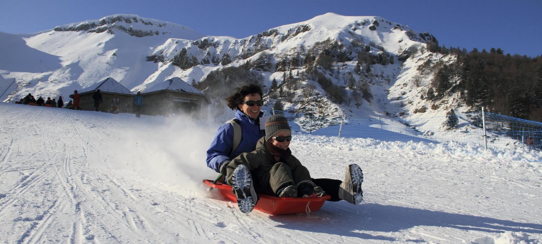 Massif du Sancy: Duo Sledding at Mont-Dore, Shared Pleasure