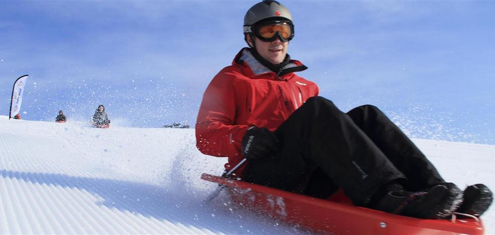 Tobogganing at Super Besse at the Luge Stadium.