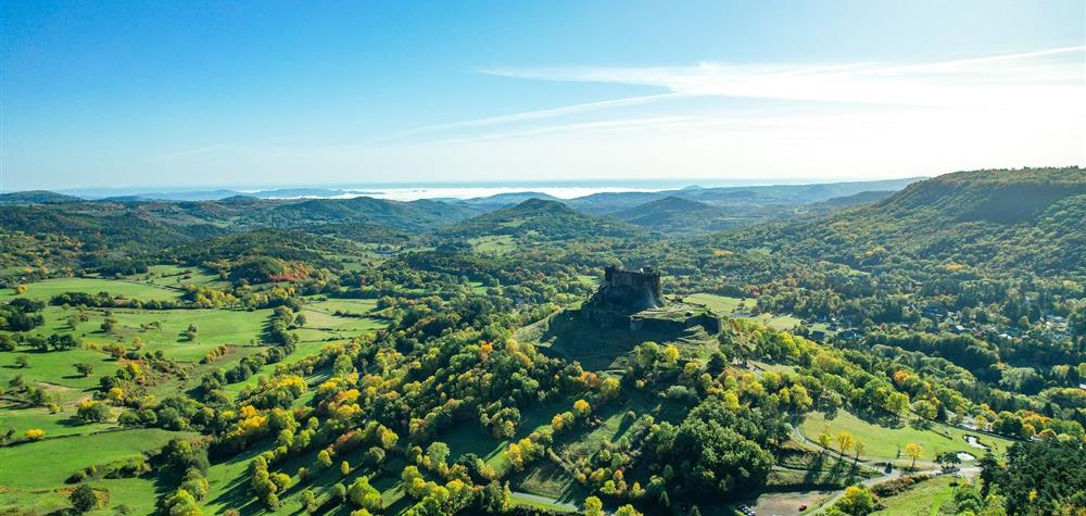 Murol Castle, perched on its rocky promontory, dominates the Auvergne countryside.