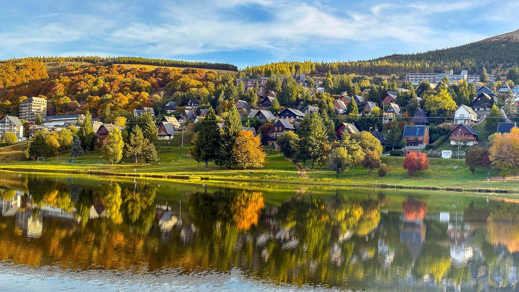 Super Besse in Autumn: Magical Reflections on Lac des Hermines