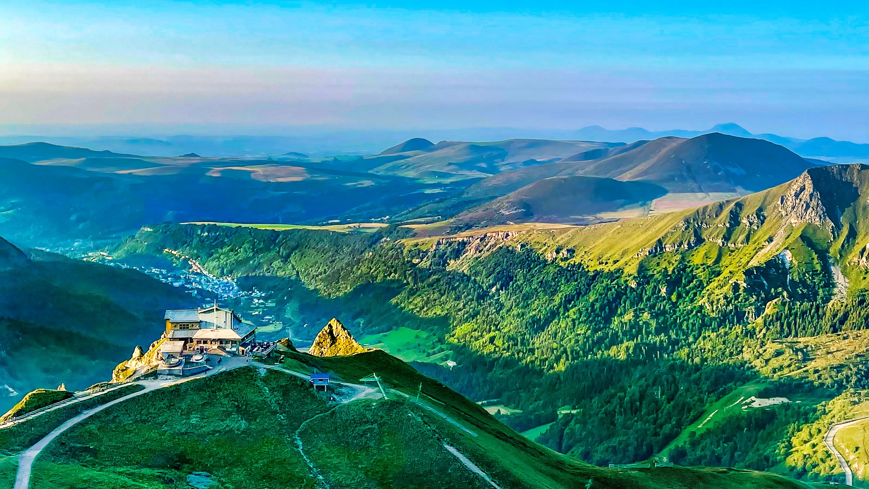 Arrival station of the Cable Car: Golden Light of the Sunset on the Roc de Cuzeau and the Massif Adventif