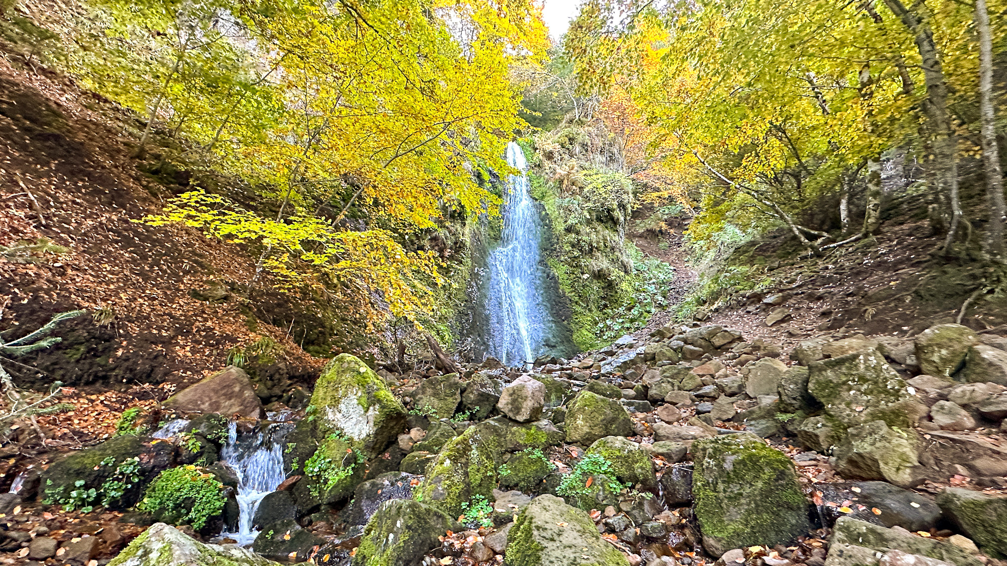 Chaudefour Valley: Shimmering waterfalls in autumn.