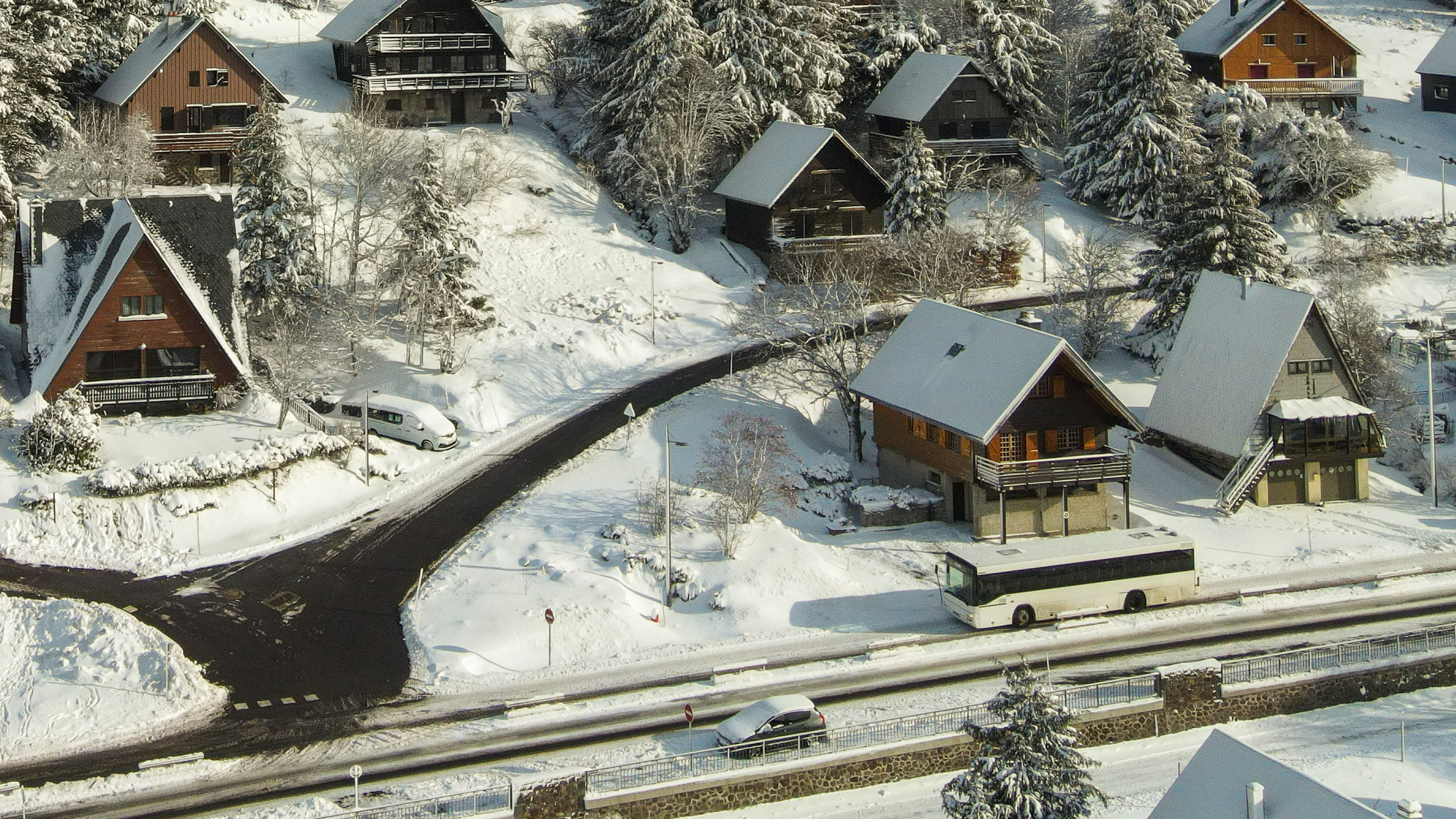 Aerial view of Super Besse with the station shuttle under the snow.