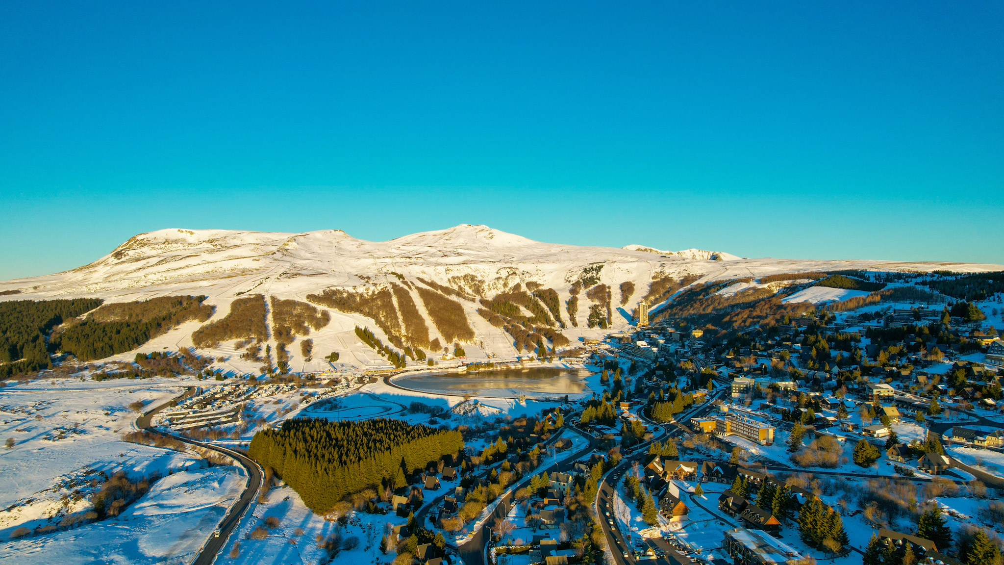 Super Besse: Golden Sunrise over a Magical Landscape