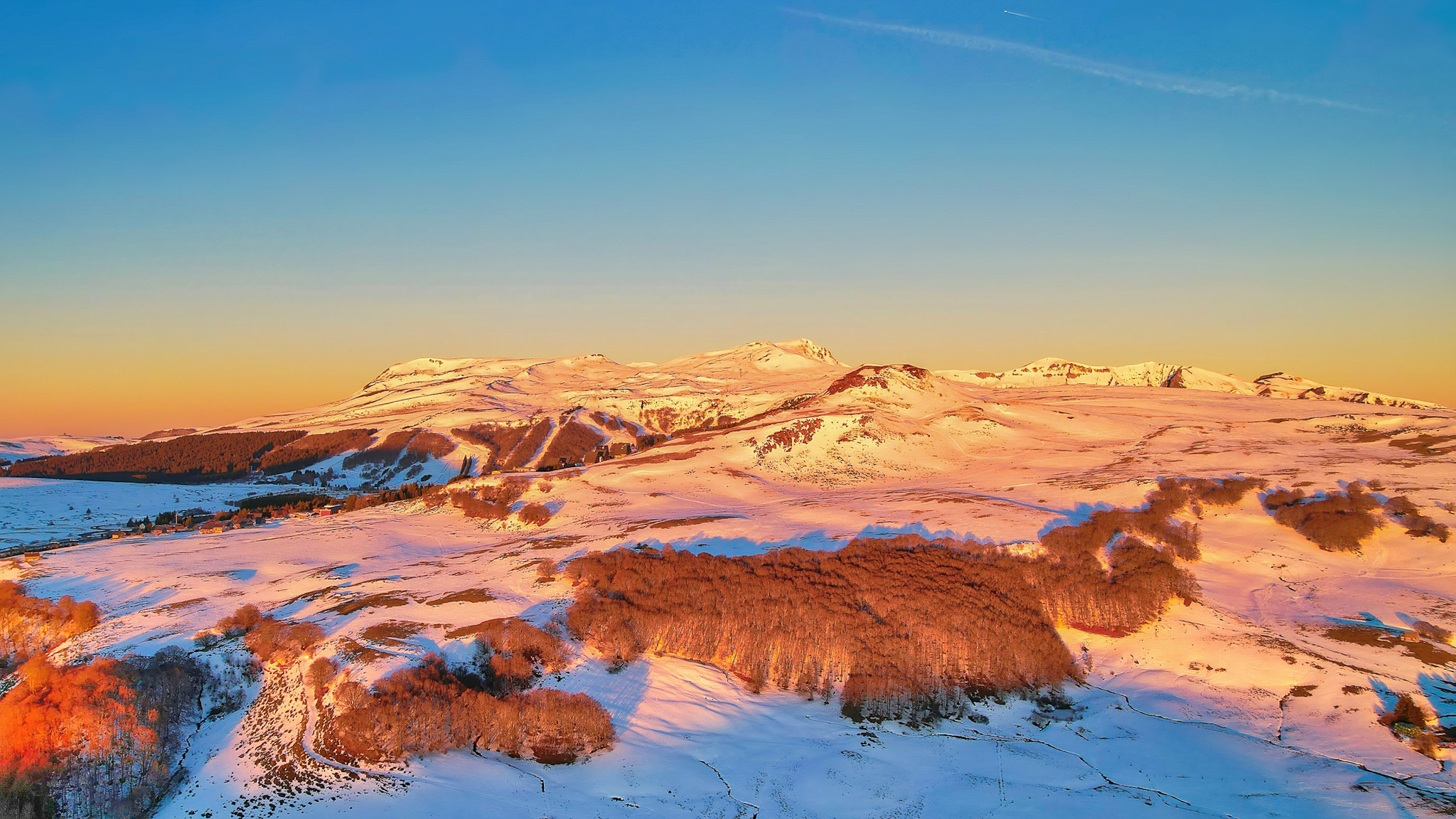 Super Besse - Magical view of snow-covered Super Besse from Lake Pavin