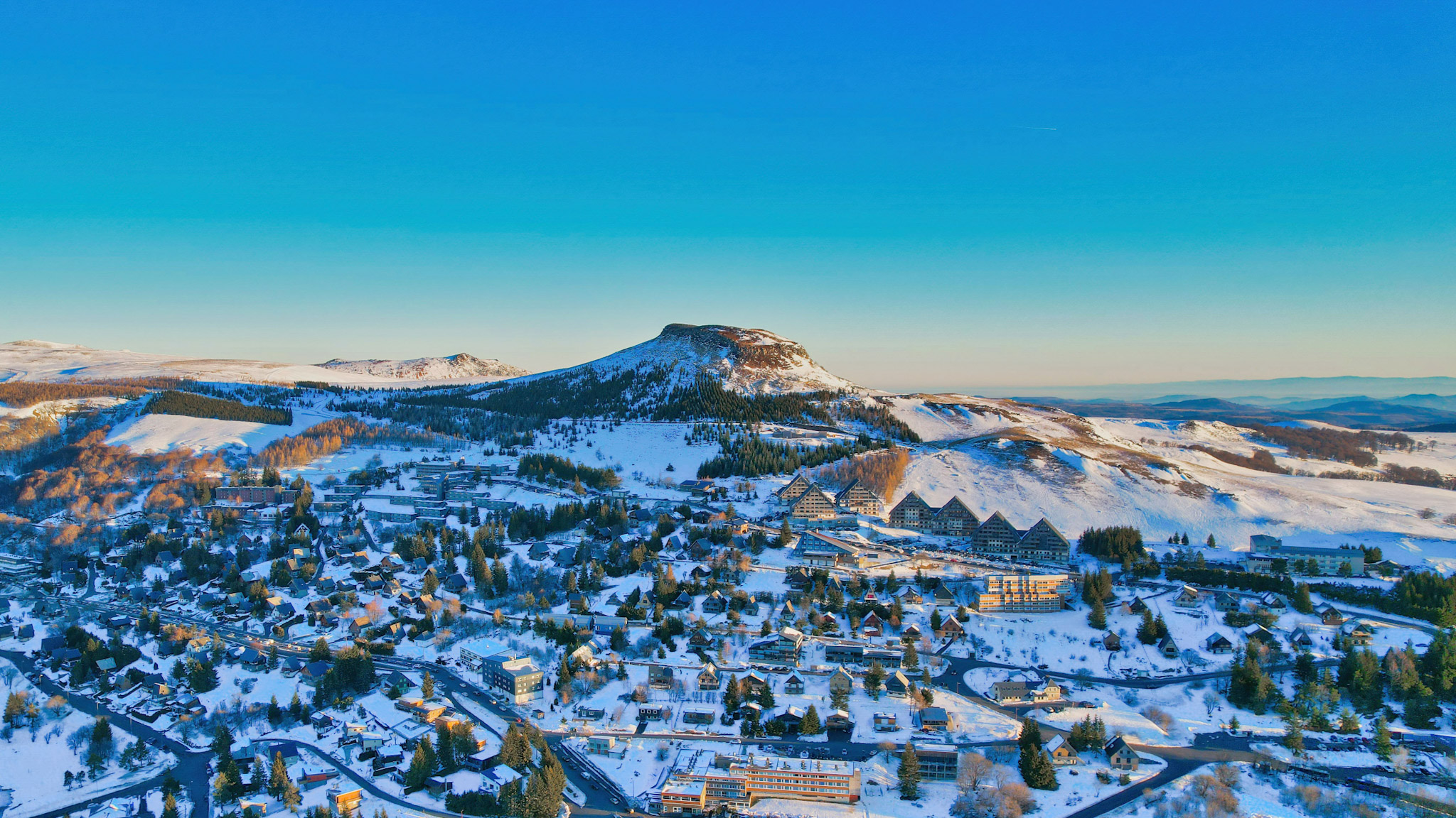 Super Besse: an authentic chalet village at the foot of the majestic Puy du Chambourguet.