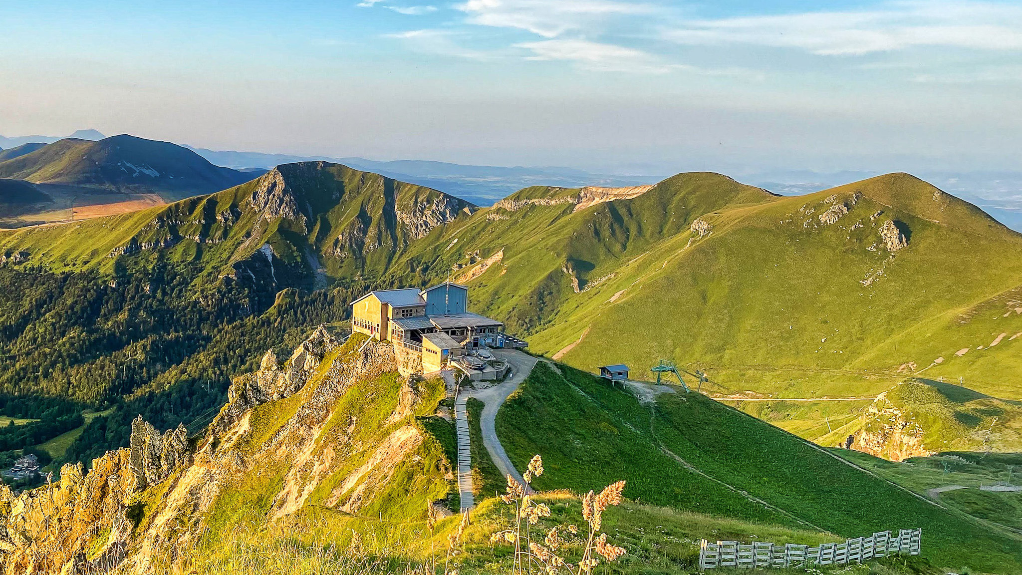 Super Besse - Evening Magic: Cable car arrival station, Roc de Cuzeau and Puy des Crebasses illuminated