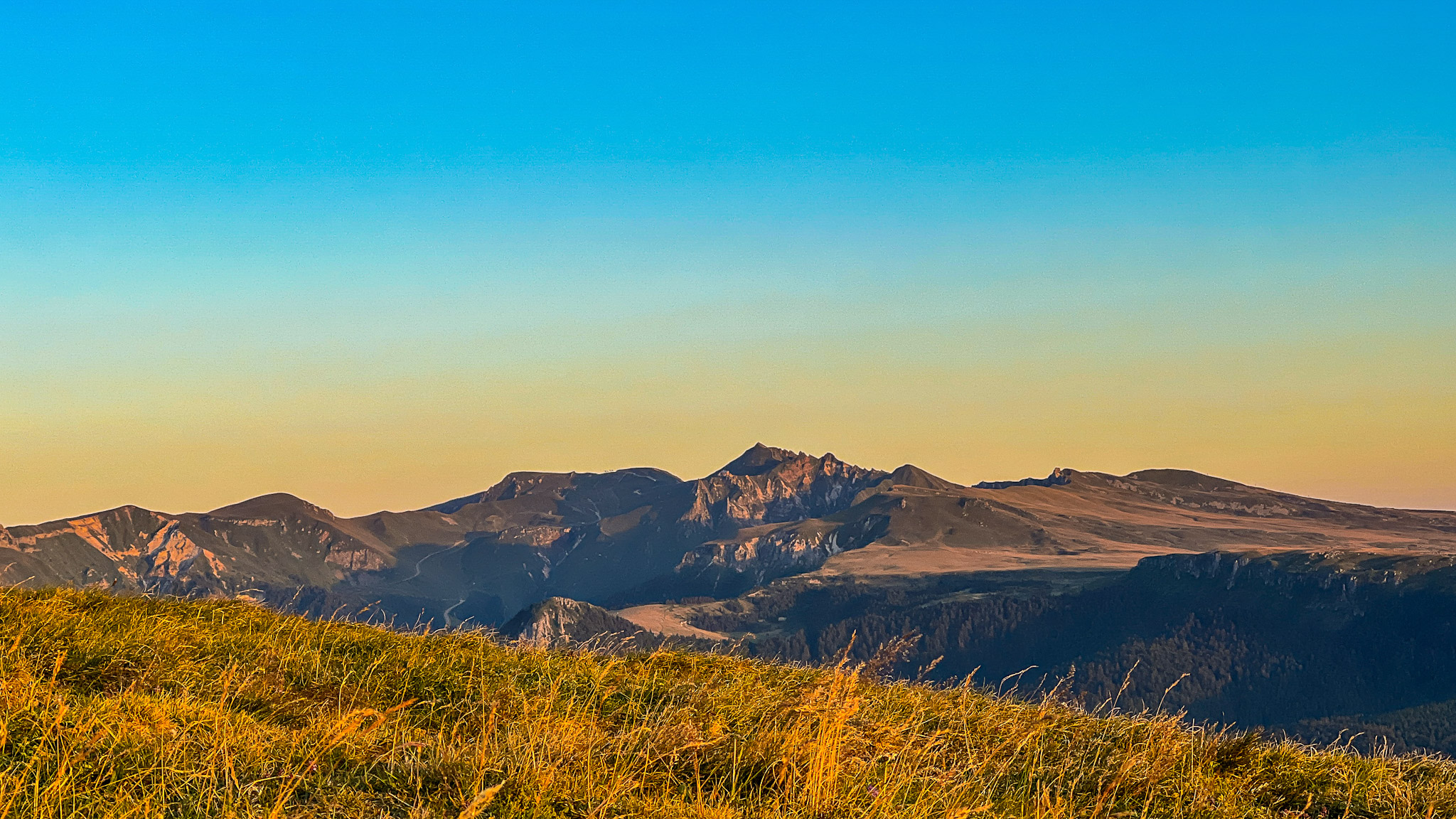 Banne d'Ordanche: Spectacular Sunset over the Sancy Massif in the Monts Dore