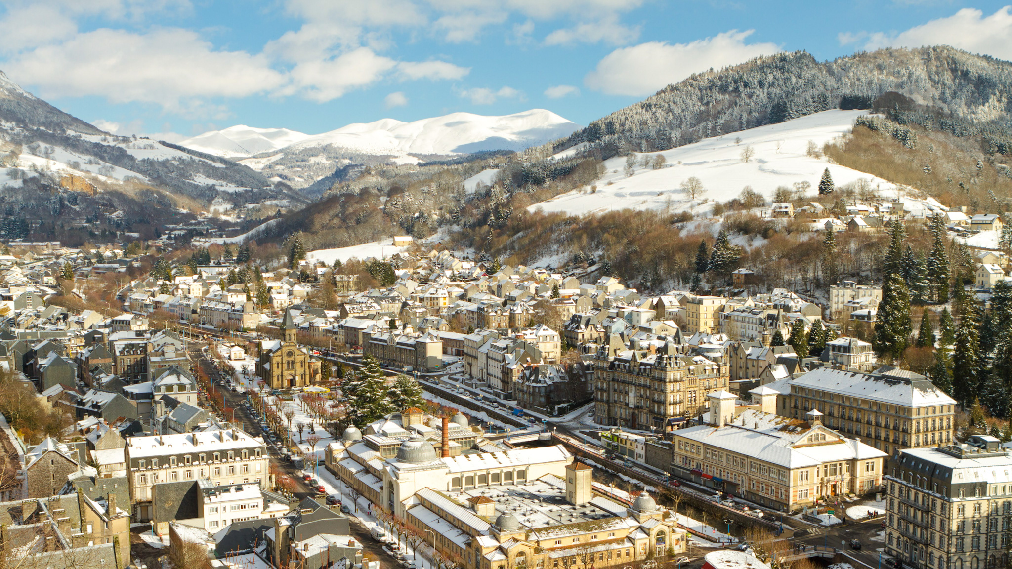 Snow-capped Monts Dore: Winter Splendor and Dominant View of La Bourboule