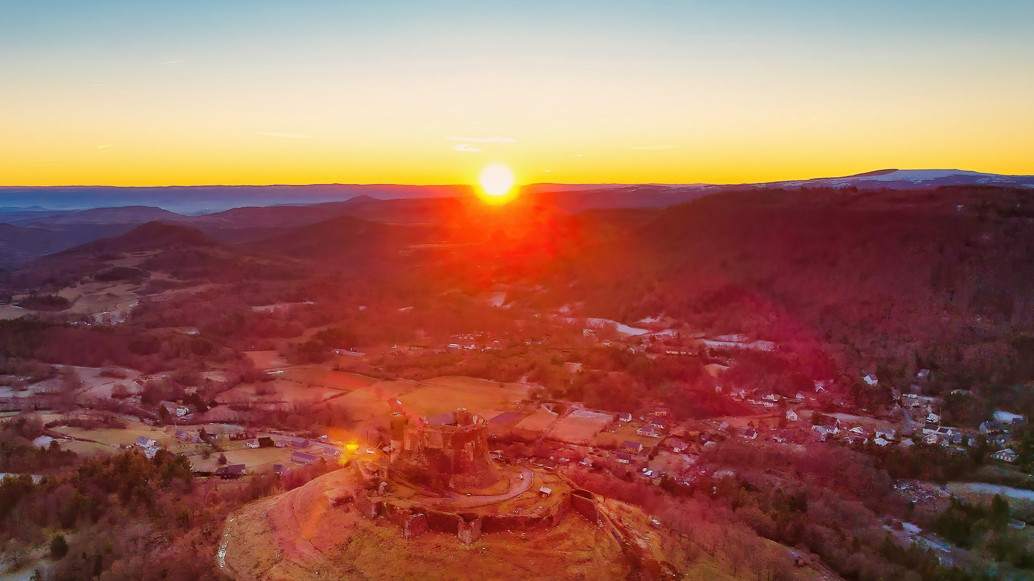 Sancy Massif: Magical Sunrise over Murol Castle