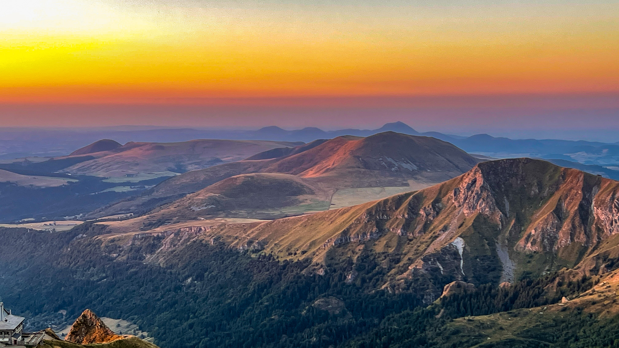 Puy Gris: Magical Sunset over the Roc de Cuzeau and the Chaîne des Puys - A Natural Spectacle