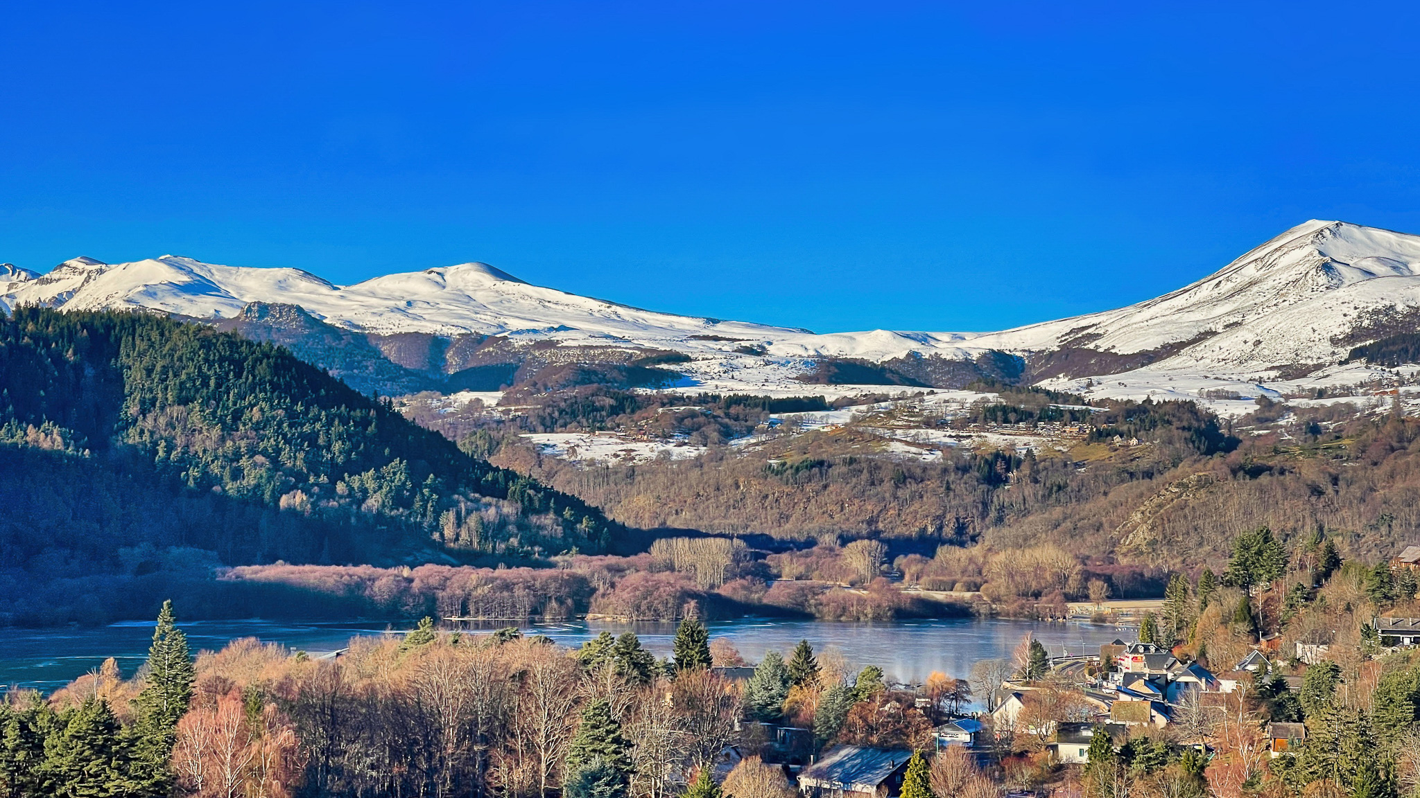 Lake Chambon: Breathtaking view of the Sancy Massif from the lake.