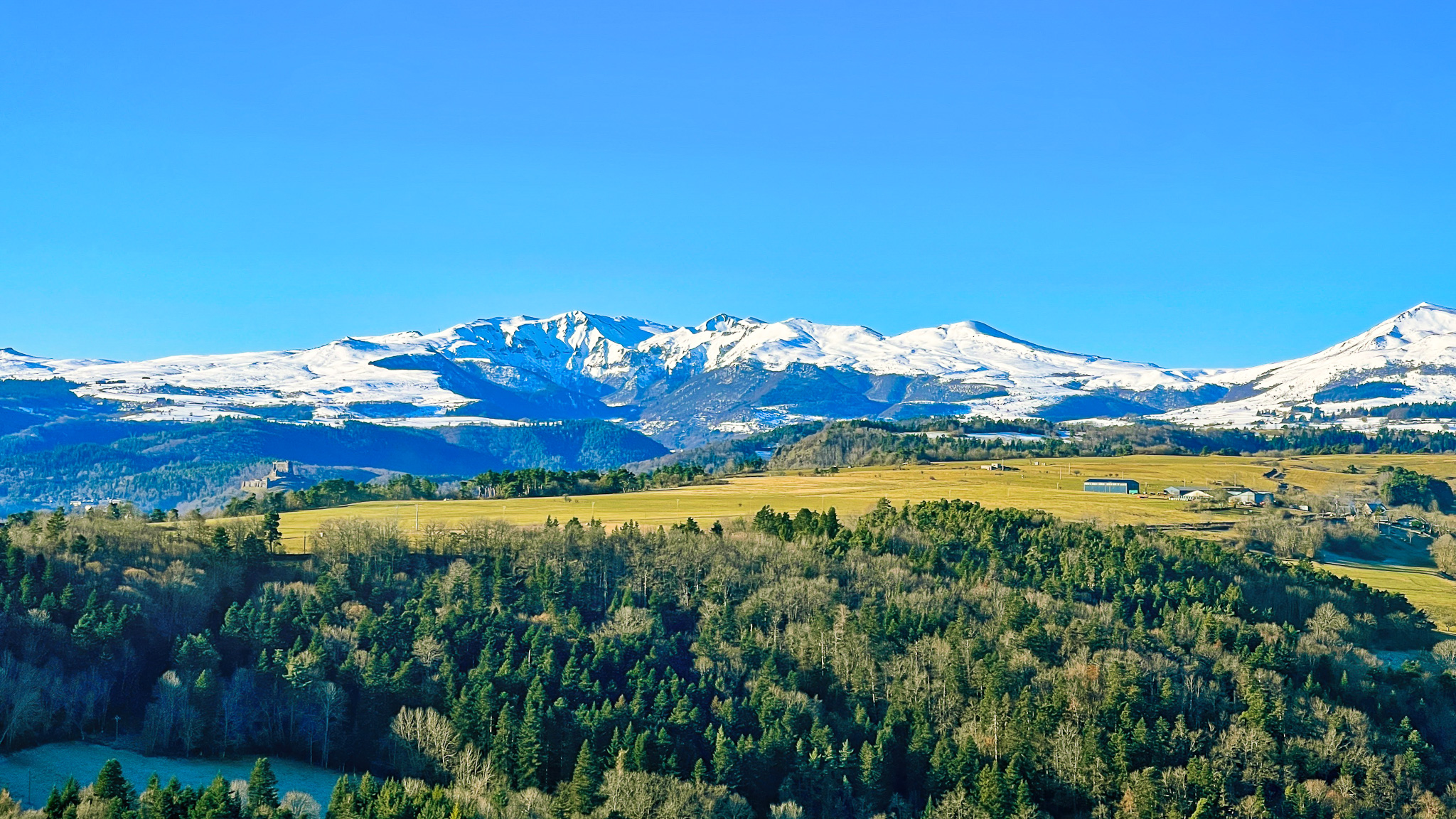 Sancy massif: A striking contrast between the summits and the Auvergne countryside.