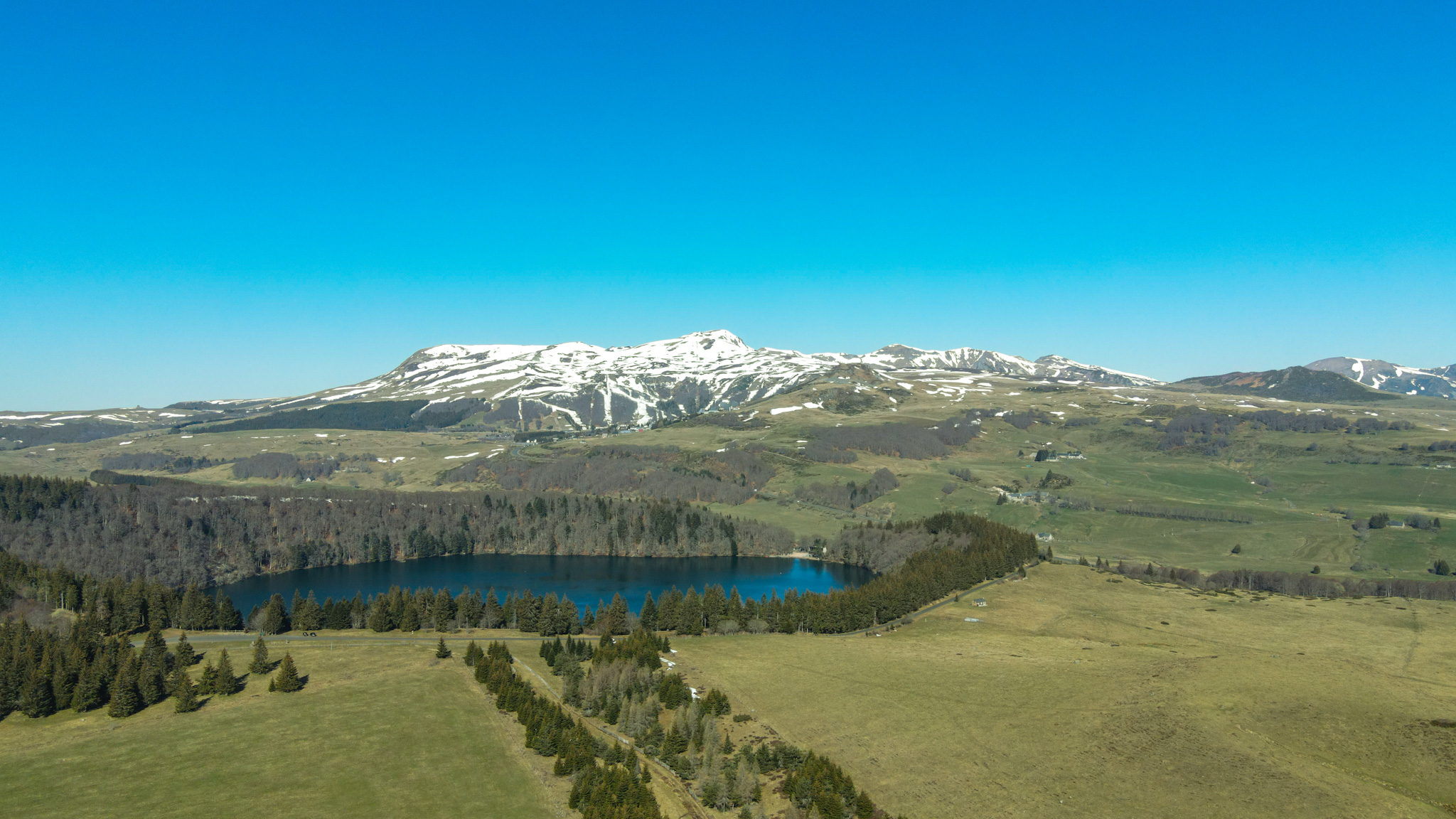 Lake Pavin and Sancy Massif: Last Snow on the Summits