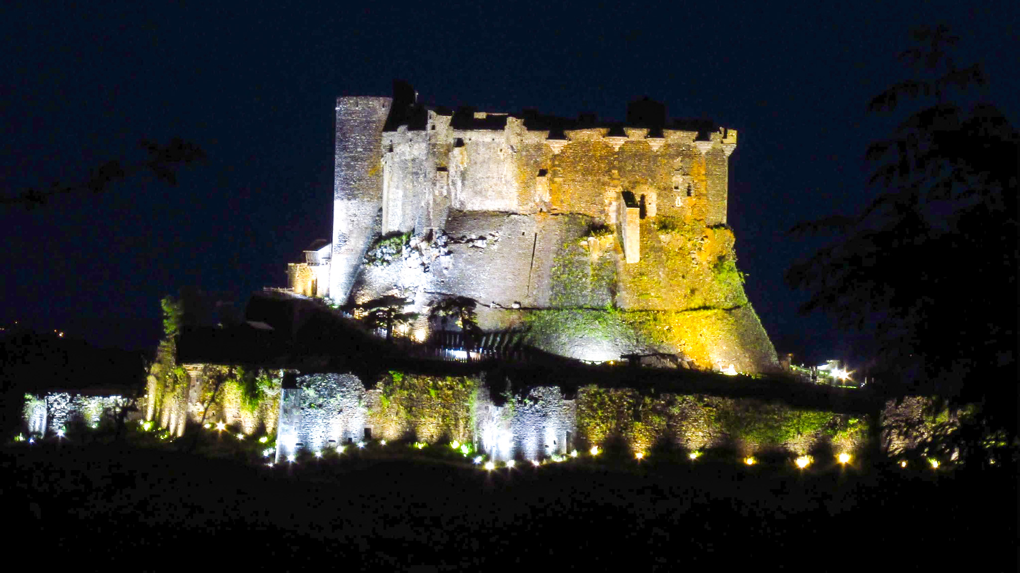 Murol Castle: Illuminated Splendor at Night